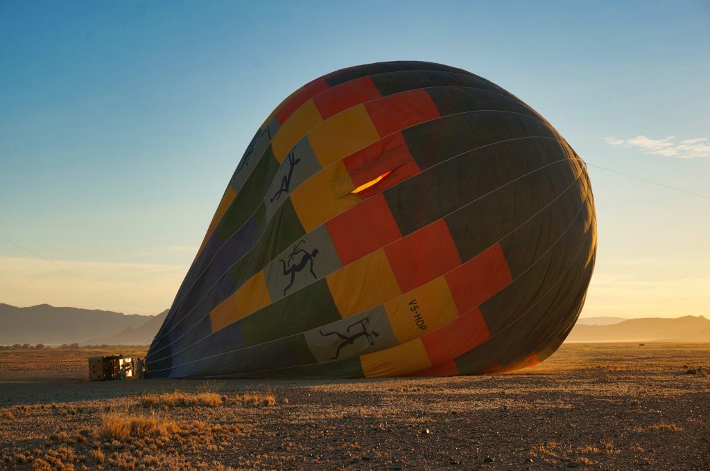 hot air balloon lying on ground